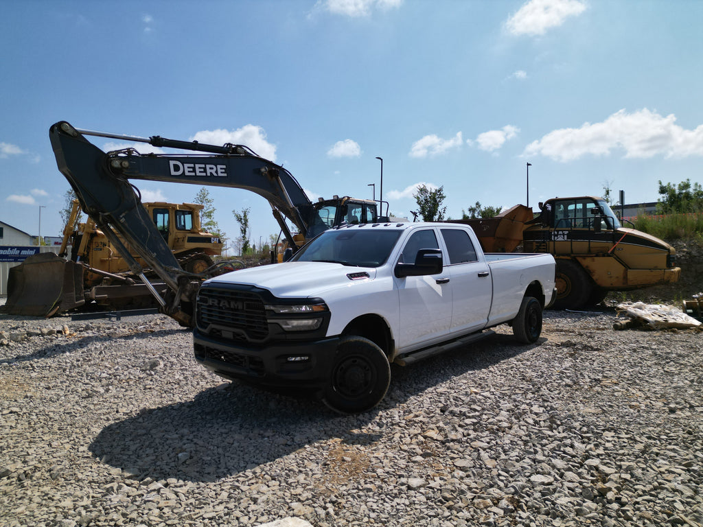 white work truck on a construction site background