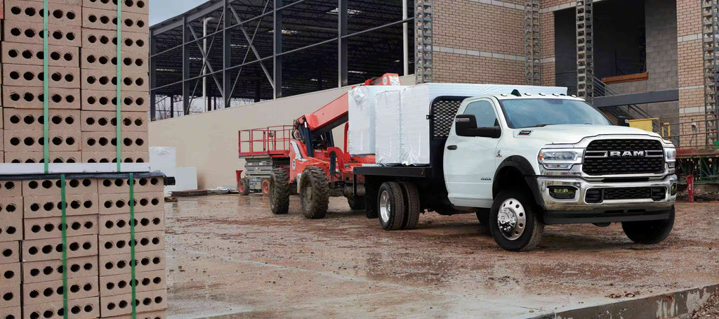 white work truck transporting materials